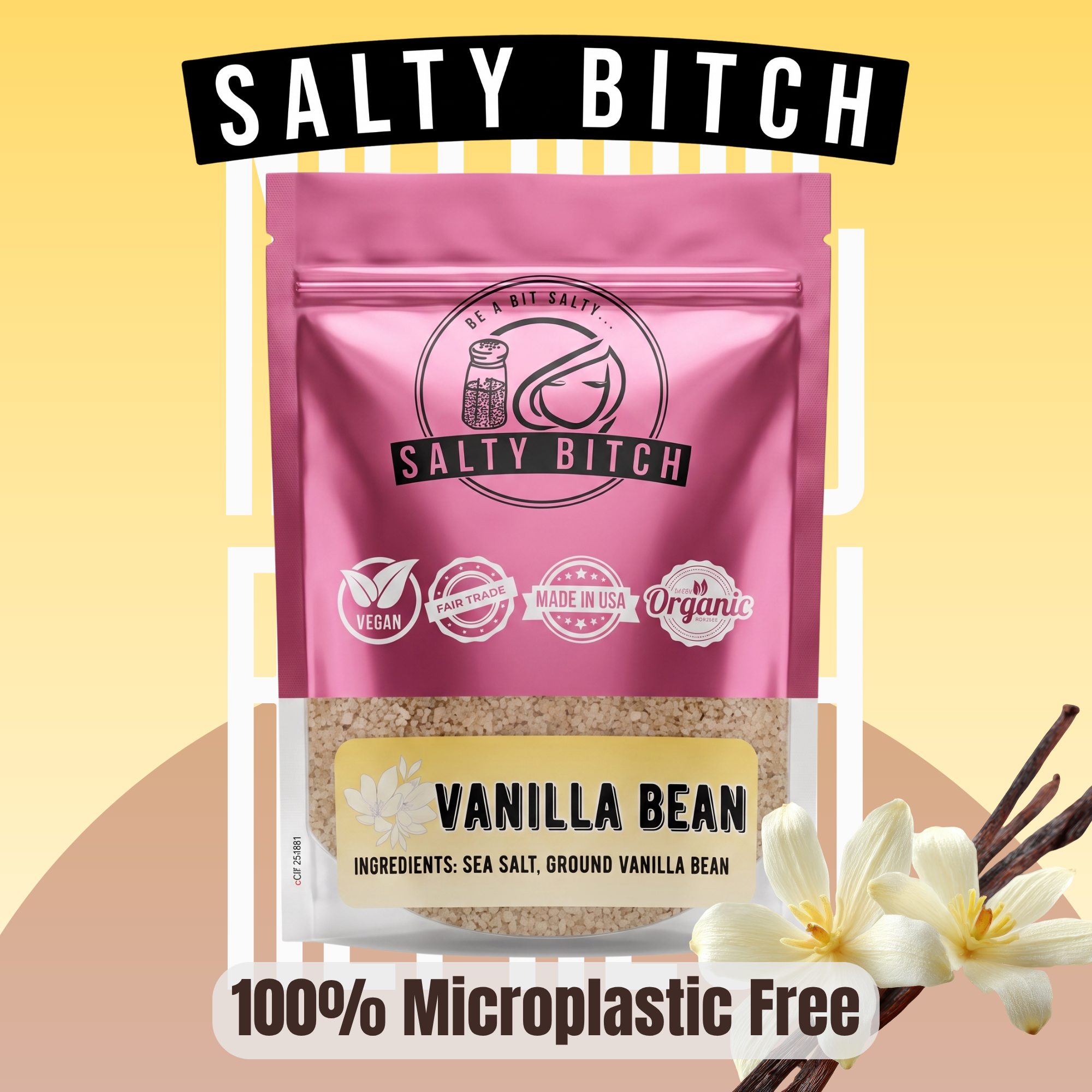 A stand-up pouch of Salty Bitch Vanilla Bean sea salt with a pink upper half and a clear lower half showing the tan vanilla bean powder inside. The pouch has the Salty Bitch logo and icons for vegan, non-GMO, made in USA, and organic.